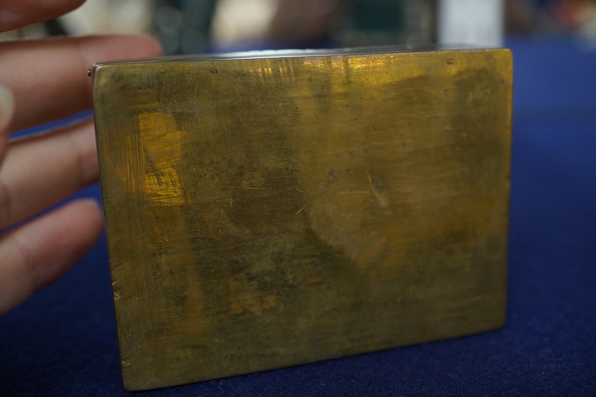 Two miniature turquoise inlaid easel frames and a similar box, largest 18cm high